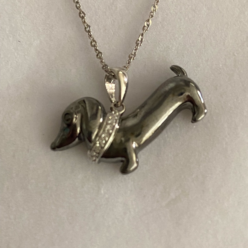 Sterling Silver Dachshund pendant 18”necklace.